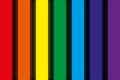 Abstract design on a black background. Bright colors of the rainbow. Rainbow stripes. Rainbow Royalty Free Stock Photo